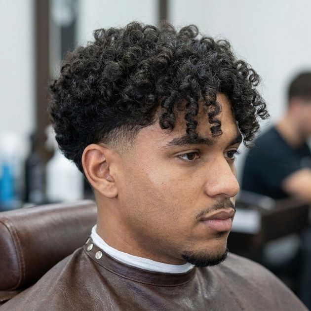 Low Taper Fade Curly Hair Curtain Bangs