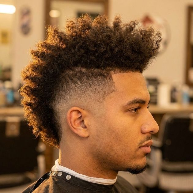 Low Taper Fade Curly Hair Mohawk Style