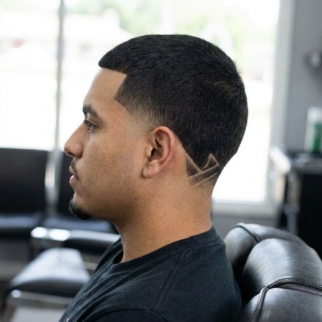Low Taper Fade Black Haircut with Design