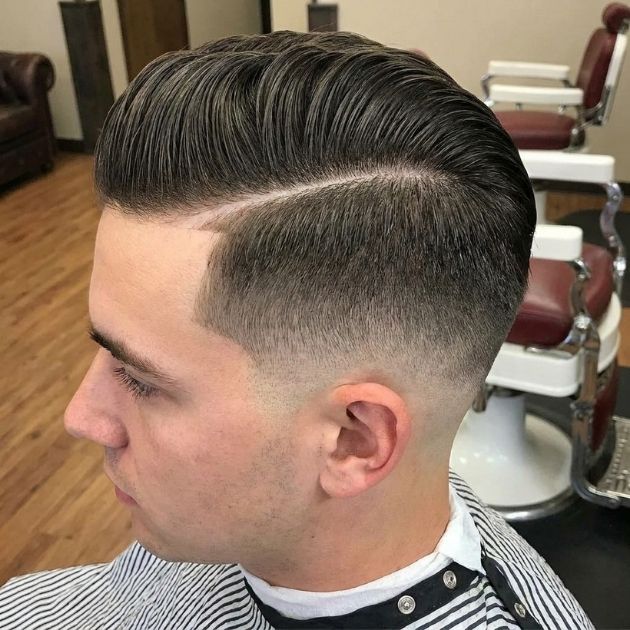 Low Taper Fade Slick Back with Hard Part